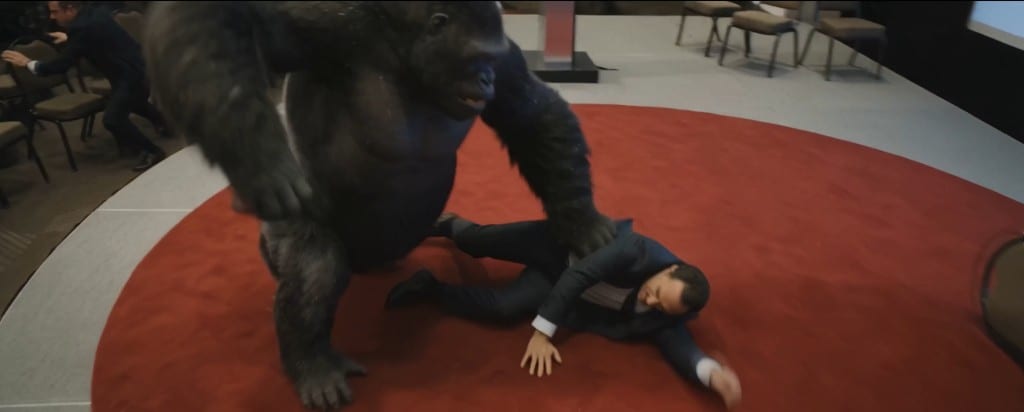 WIZE Can do comedy — gorilla on a red carpet attacking a businessman