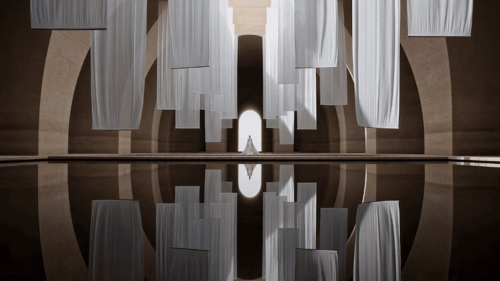 WIZE Fashion — figure in a hall of hanging white drapes