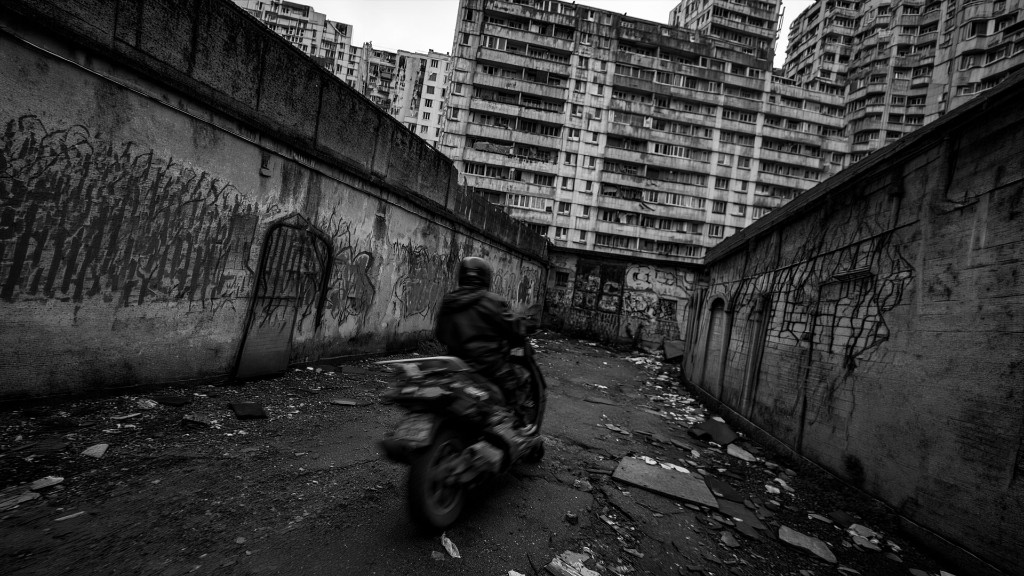 No Zone — rider on a motorcycle in a graffiti alley