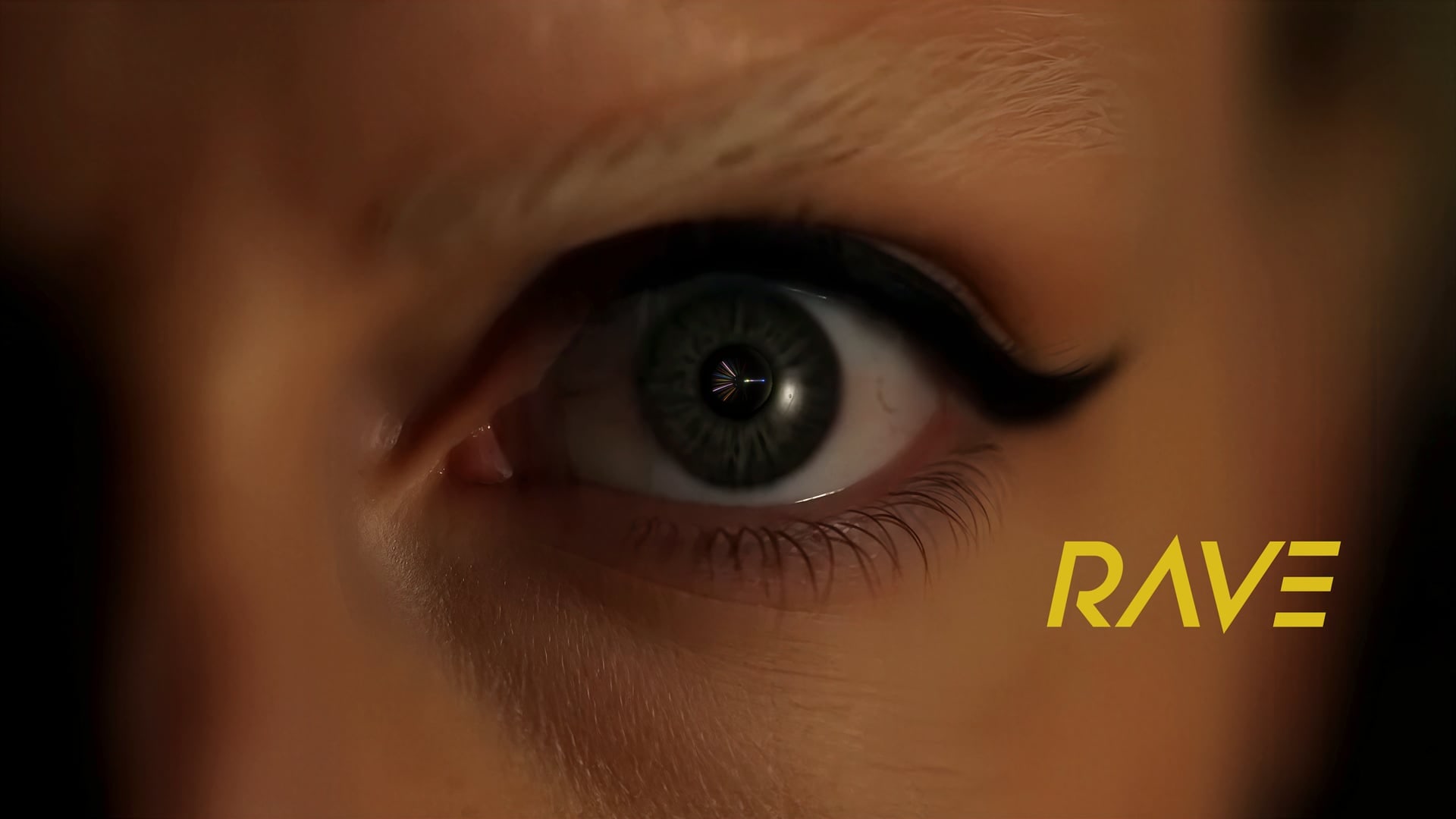 Rave — close-up of an eye with yellow title